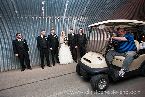 bridal party and golf cart in tunnel at the Marshes