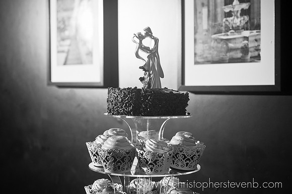 wedding cake and sculpted cake topper