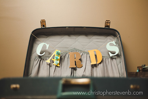 DIY wedding decor idea using suitcase for cards