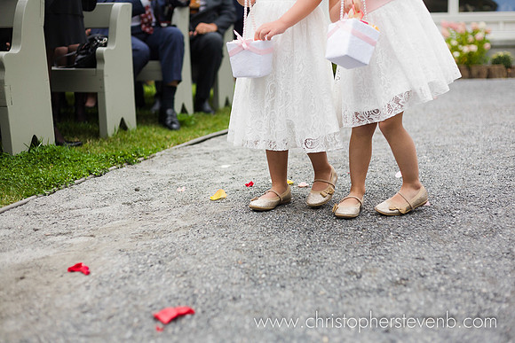 flower girls dropping flower petals during ceremony