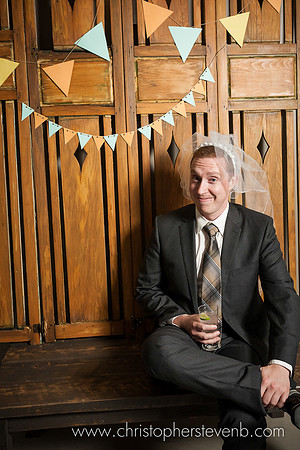 funny photo of man with wedding veil looking lonely in photo booth