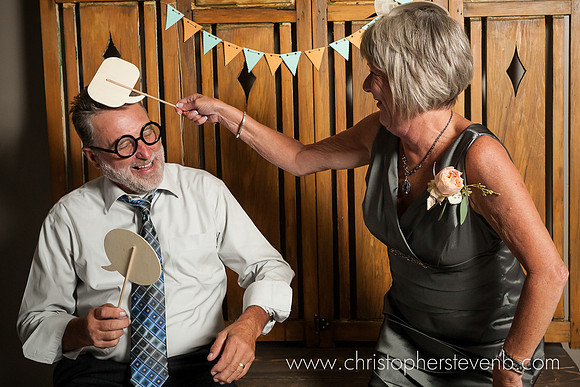 funny photo booth image with woman hitting her husband