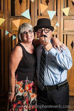 guests wearing funny glasses and hat
