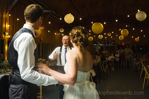 funny photo of grandfather stealing bride from groom during first dance