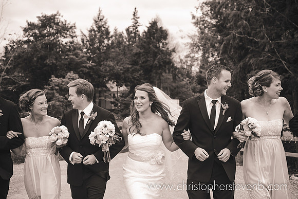 bridal party arms interlinked walking