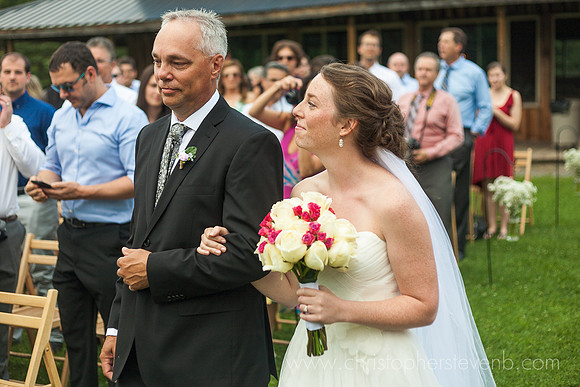 bride and her father walking down the aisle at Saunders Farm