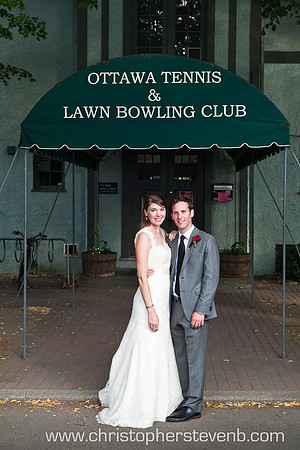 Bride and groom standing in front of Ottawa Tennis and Lawn Bowling Club