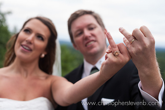 rude wedding finger given by bride and groom